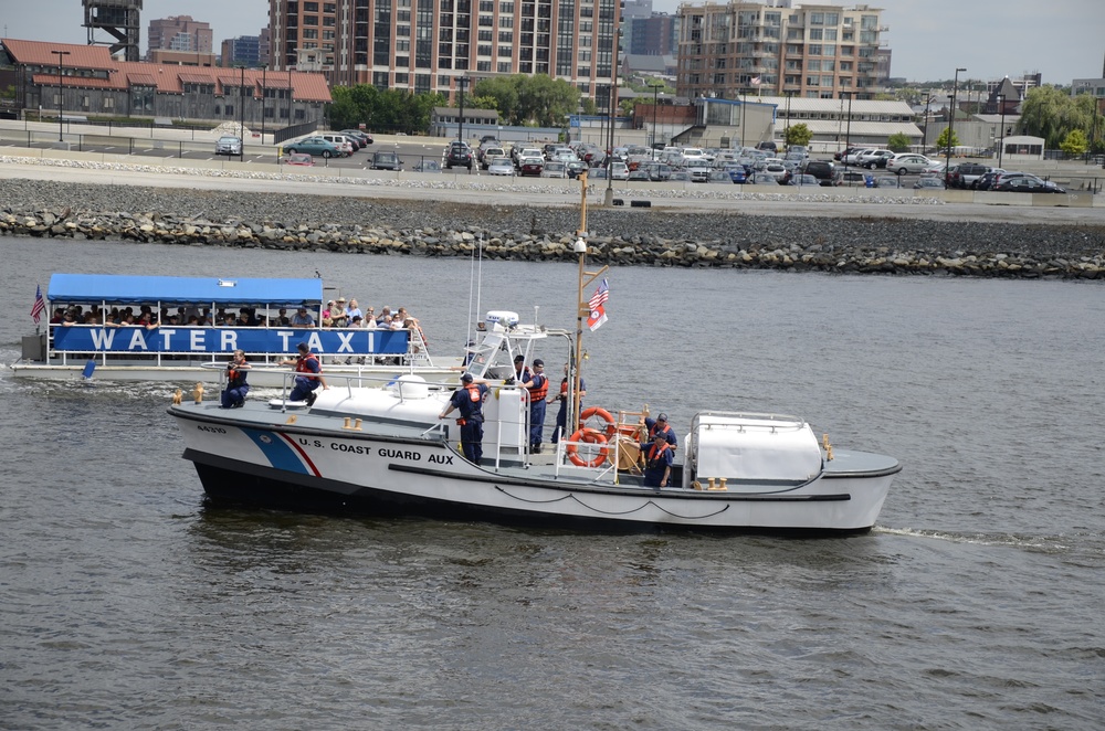 Coast Guard Auxiliary personnel patrol in the Port of Baltimore