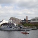 Coast Guard Vessel 25667 patrols near the USS Zephyr (PC 8) in the Port of Baltimore