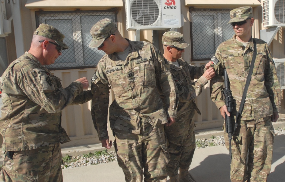 411th engineers receive shoulder sleeve insignia for wartime service