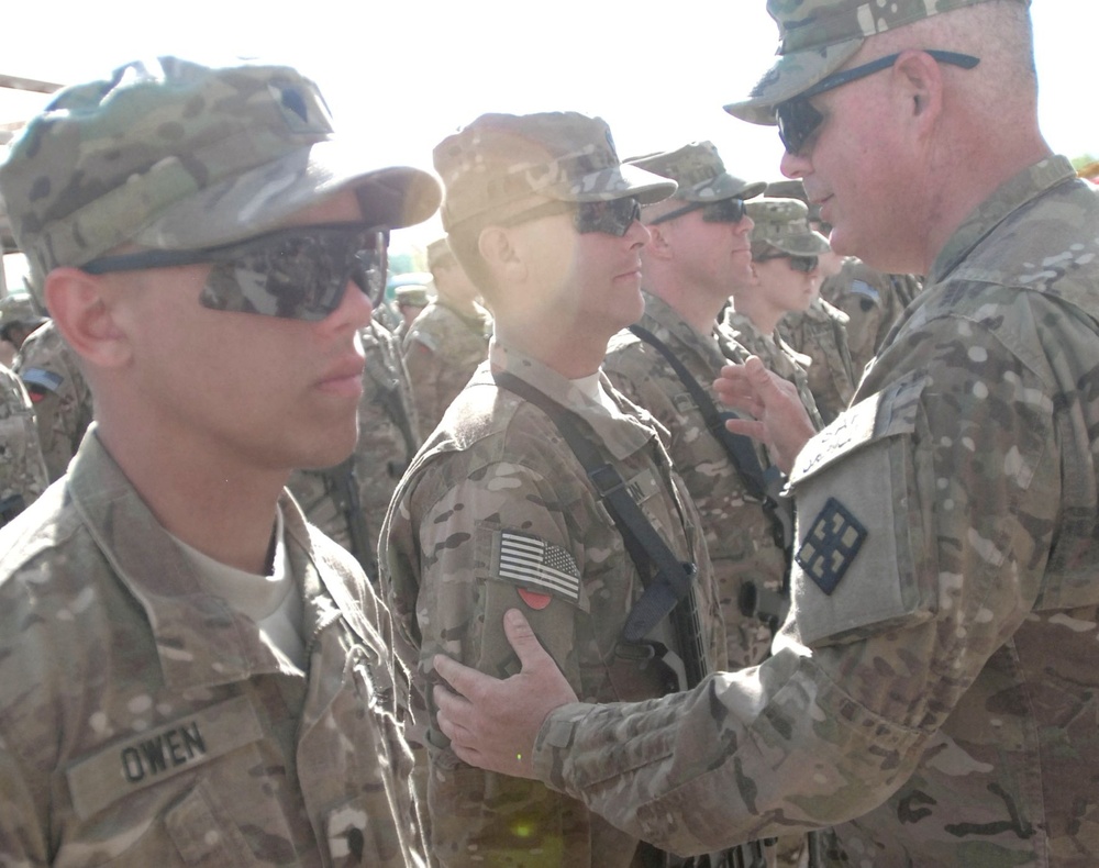 411th engineers receive shoulder sleeve insignia for wartime service