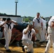 USS Constitution sailors perform on Baltimore's Inner Harbor