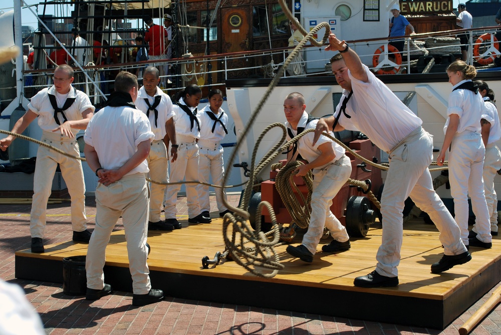 USS Constitution sailors perform on Baltimore's Inner Harbor