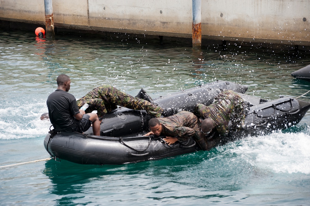 Members of the Barbados Defence Force perform vessel debarkation drills during Exercise Tradewinds 2012