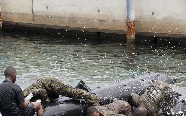 Members of the Barbados Defence Force perform vessel debarkation drills during Exercise Tradewinds 2012
