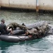 Members of the Barbados Defence Force perform vessel debarkation drills during Exercise Tradewinds 2012