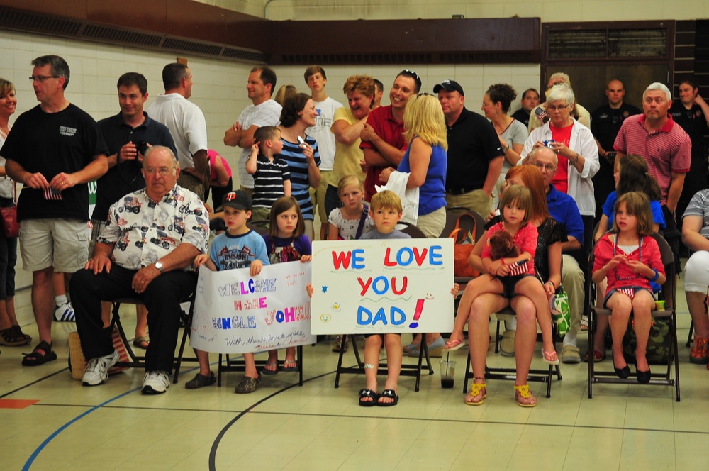 Family and friends wait for their soldiers to come home