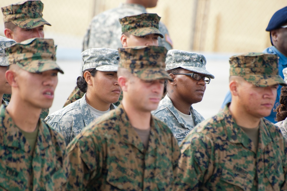 United States military personnel stand at attention during the opening ceremony for Exercise Tradewinds 2012