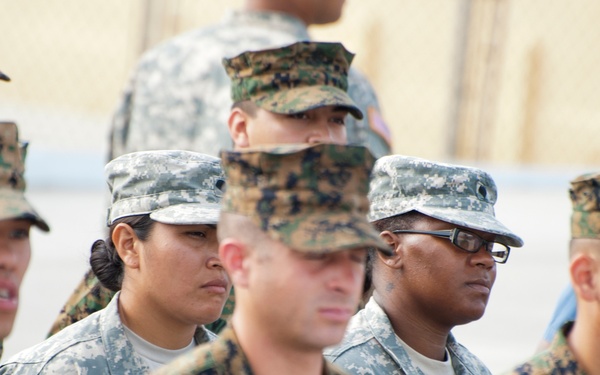 United States military personnel stand at attention during the opening ceremony for Exercise Tradewinds 2012