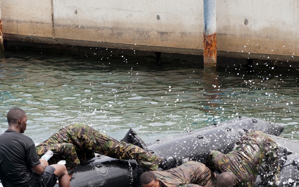 Members of the Barbados Defence Force perform small vessel debarkation drills during Exercise Tradewinds 2012