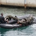 Members of the Barbados Defence Force perform small vessel debarkation drills during Exercise Tradewinds 2012