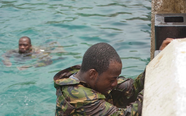 Members of the Barbados Defence Force perform small vessel debarkation drills during Exercise Tradewinds 2012