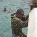 Members of the Barbados Defence Force perform small vessel debarkation drills during Exercise Tradewinds 2012