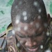 A member of the Barbados Defence Force takes a break after perform vessel debarkation drills during Exercise Tradewinds 2012