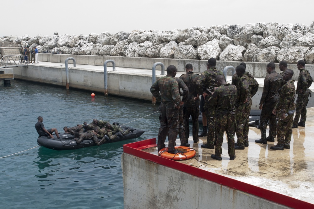 Members of the Barbados Defence Force perform small vessel debarkation drills during Exercise Tradewinds 2012