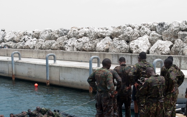 Members of the Barbados Defence Force perform small vessel debarkation drills during Exercise Tradewinds 2012