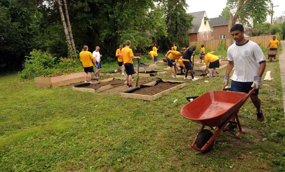 Sailors build garden during Baltimore Navy Week