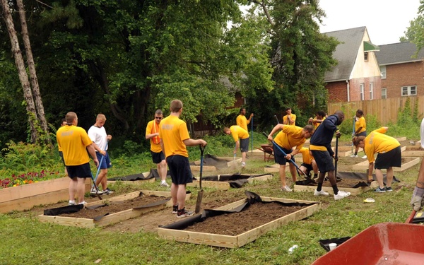 Sailors build garden during Baltimore Navy Week