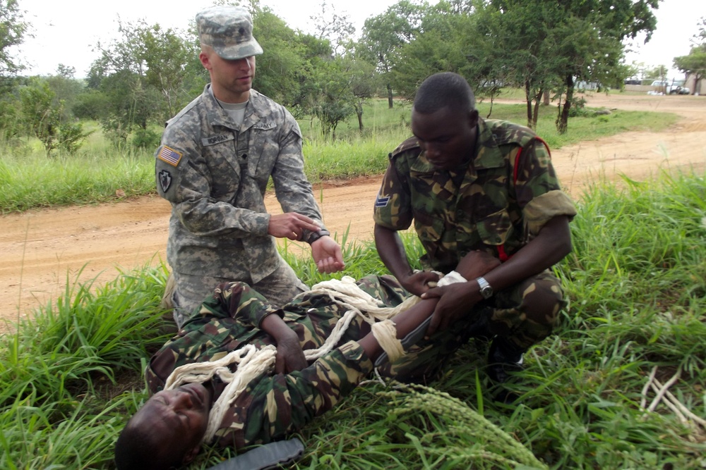 Texas National Guardsmen and Tanzanian People's Defense Forces medical professionals come togther to exchange best practices