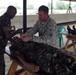 Texas National Guardsmen and Tanzanian People's Defense Forces medical professionals come togther to exchange best practices