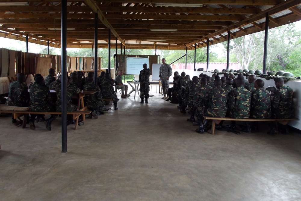 Texas National Guardsmen and Tanzanian People's Defense Forces medical professionals come togther to exchange best practices