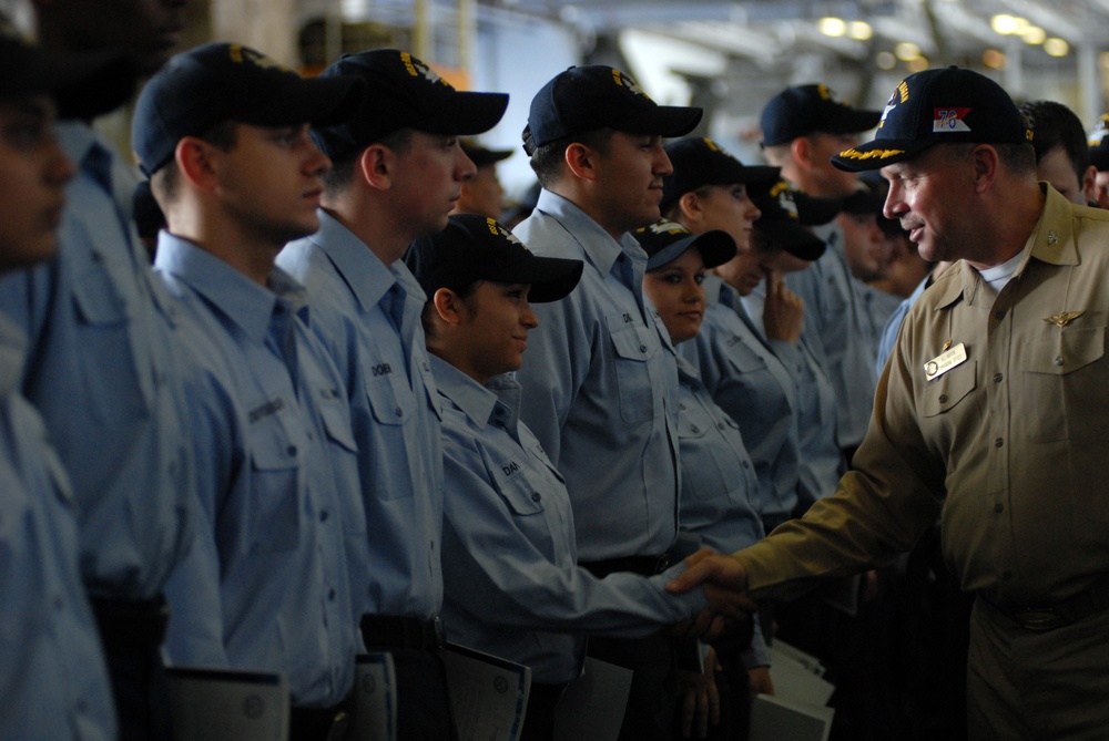 Congratulating newly frocked sailors