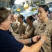 Mother pins daughter aboard USS Makin Island