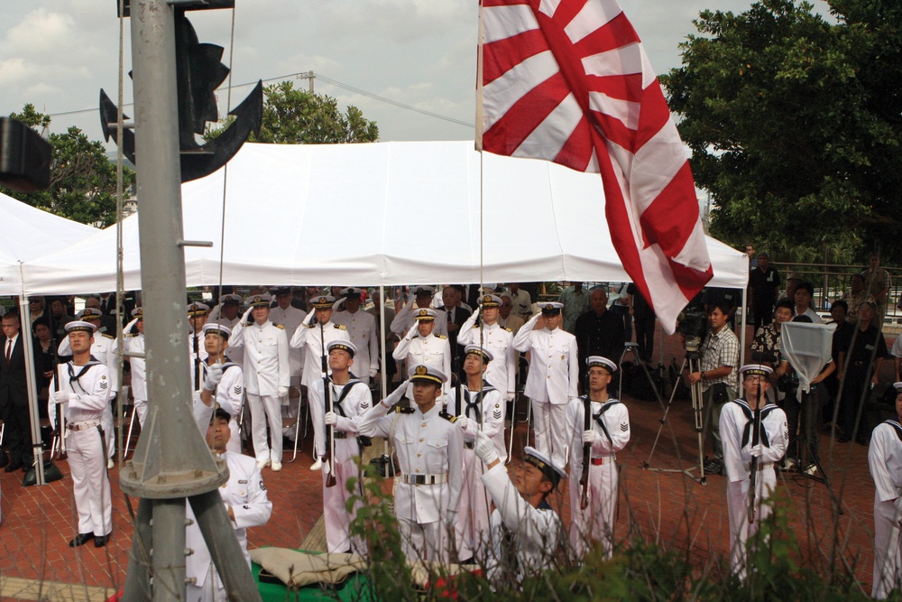Passing of flag reflects mutual respect for losses during battle