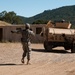 Reservist guides Humvee during training