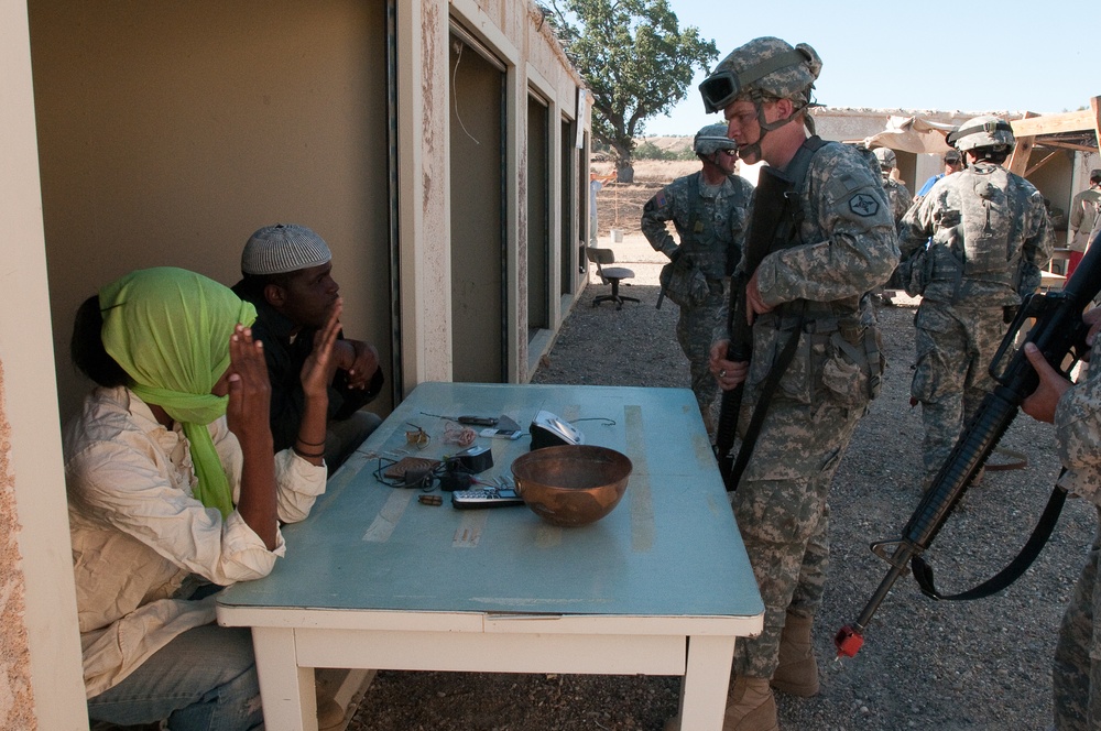 Reservist interacts with role players during exercise