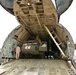 Soldiers offload helicopter in Afghanistan