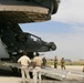 Soldiers offload helicopter in Afghanistan