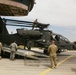 Soldiers offload helicopter in Afghanistan
