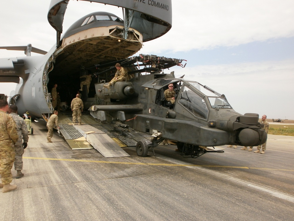 Soldiers offload helicopter in Afghanistan