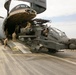 Soldiers offload helicopter in Afghanistan