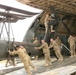 Soldiers offload helicopter in Afghanistan