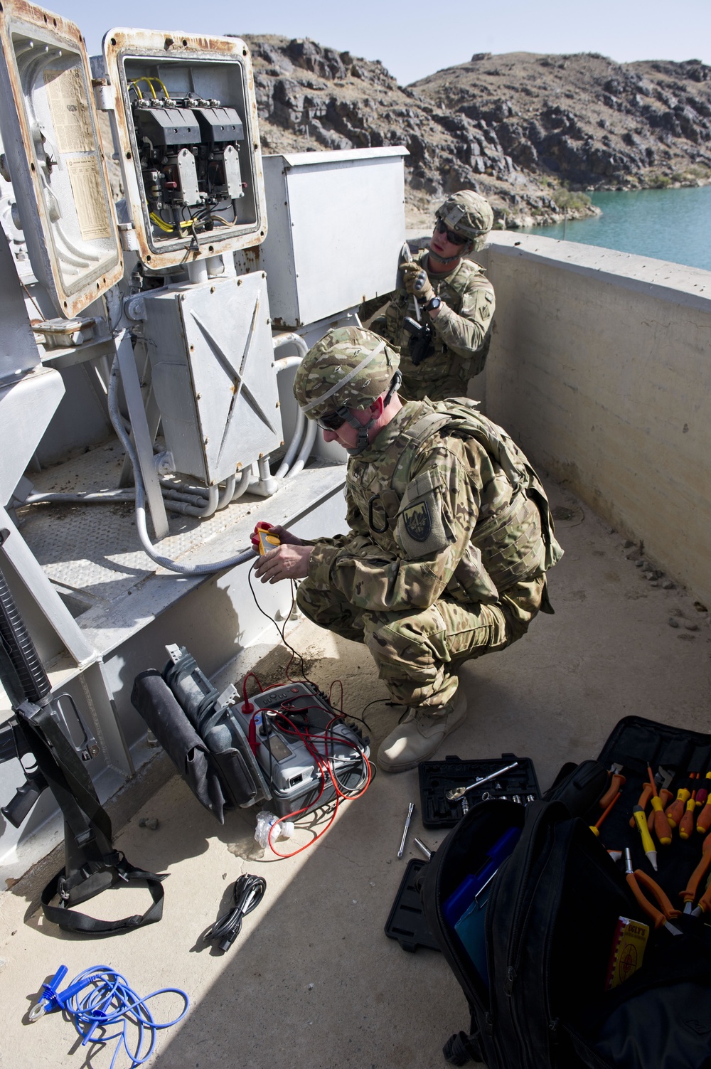 Prime Power soldiers test electrical equipment at Dahla Dam