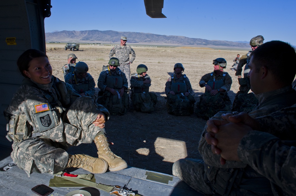 Utah Army National Guard performing static line jumps from Black Hawks