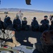 Utah Army National Guard performing static line jumps from Black Hawks