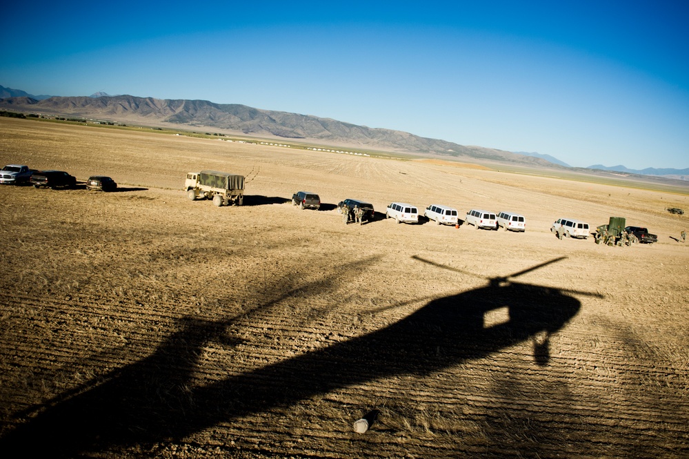 Utah Army National Guard performing static line jumps from Black Hawks