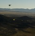 Utah Army National Guard performing static line jumps from Black Hawks