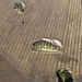 Utah Army National Guard performing static line jumps from Black Hawks