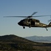 Utah Army National Guard performing static line jumps from Black Hawks