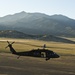 Utah Army National Guard performing static line jumps from Black Hawks