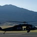 Utah Army National Guard performing static line jumps from Black Hawks