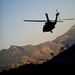 Utah Army National Guard performing static line jumps from Black Hawks