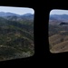 Utah Army National Guard performing static line jumps from Black Hawks