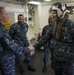 Commander of Expeditionary Strike Group 3, greets commander of Amphibious Squadron 5