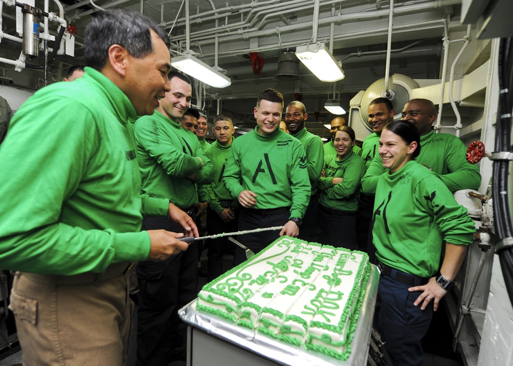 USS Nimitz sailors celebrate with cake