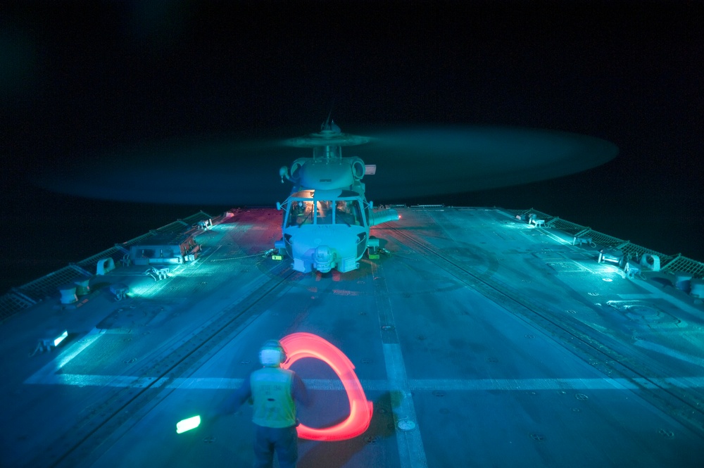 Helicopter lands aboard USS Nitze