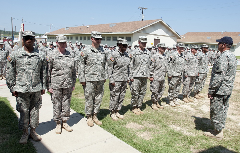 316th ESC soldiers are presented the unit coin